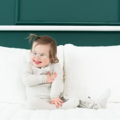 Ribbed Ruffle Zipper Footie in Oat