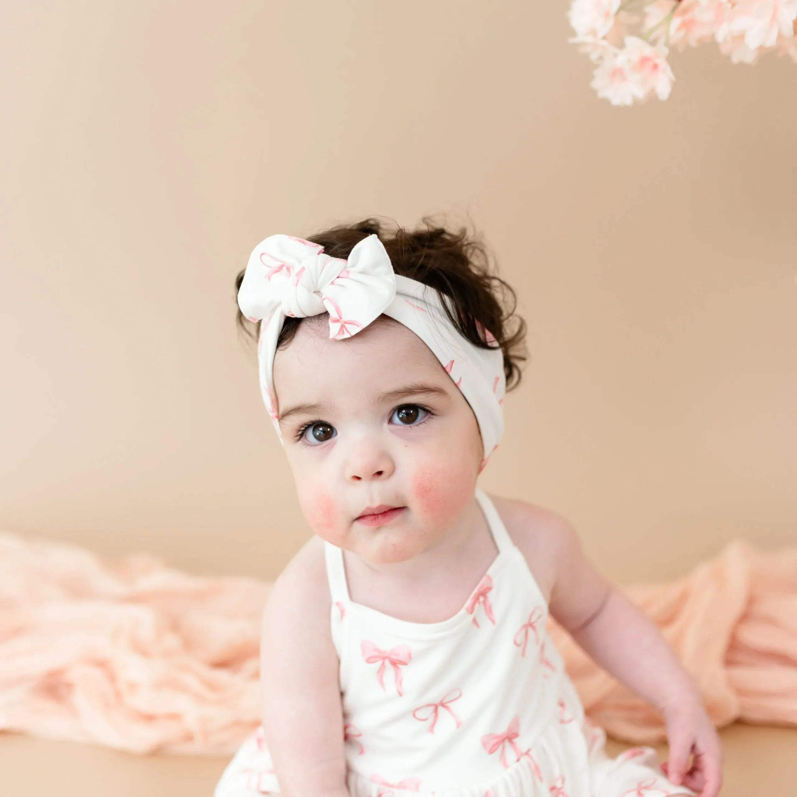 Spaghetti Strap Ruffle Romper in Bow